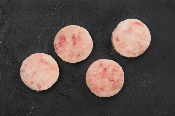 Frozen round fish cutlet for burger or frying