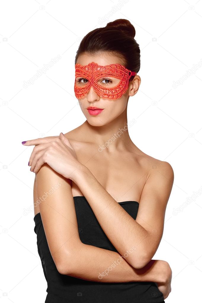 close portrait of sexy lady in red lace mask