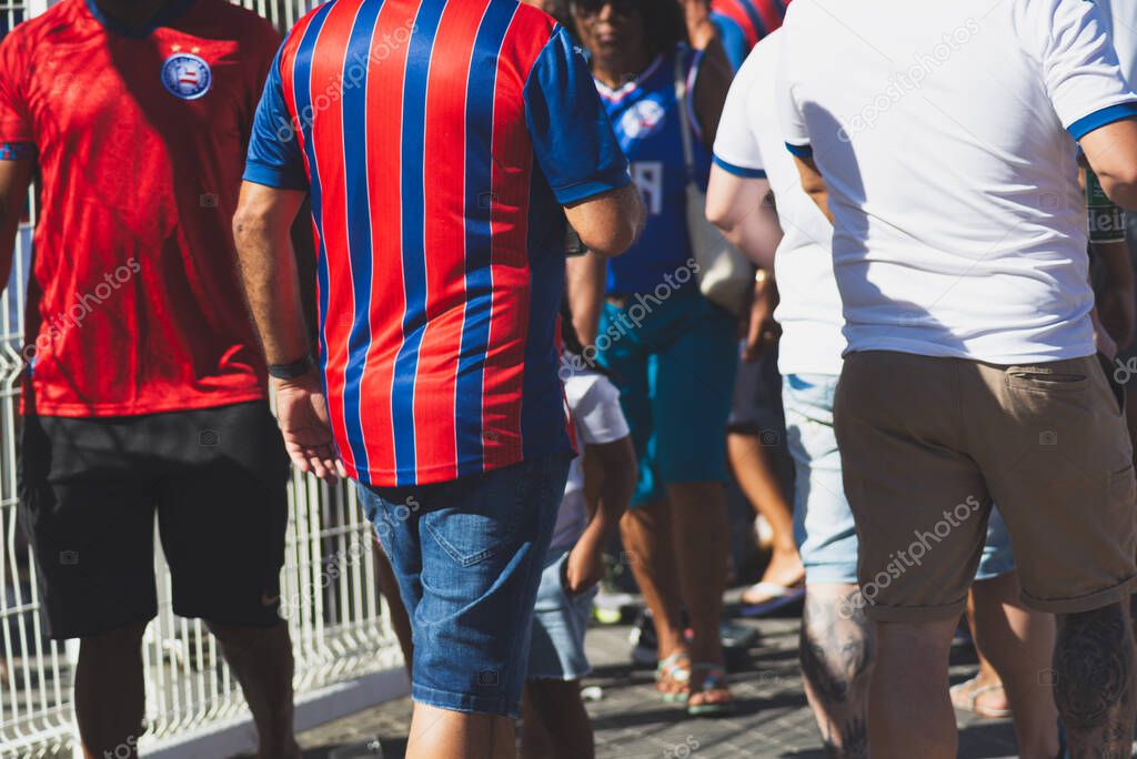 Salvador, Bahia, Brazil - November 2, 2025: Fans of Esporte Clube Bahia are seen walking towards the Fonte Nova stadium before the game. Salvador, Bahia.