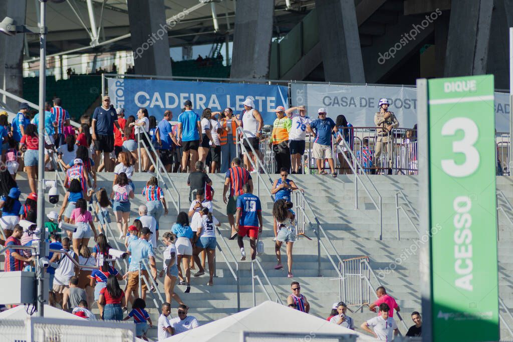 Salvador, Bahia, Brazil - November 2, 2025: Fans of Esporte Clube Bahia are seen arriving at the Arena Fonte Nova stadium on a Brazilian championship match day. Salvador, Brazil.