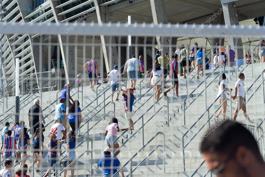Salvador, Bahia, Brazil - November 2, 2025: Fans of Esporte Clube Bahia are seen arriving at the Arena Fonte Nova stadium on a Brazilian championship match day. Salvador, Brazil.
