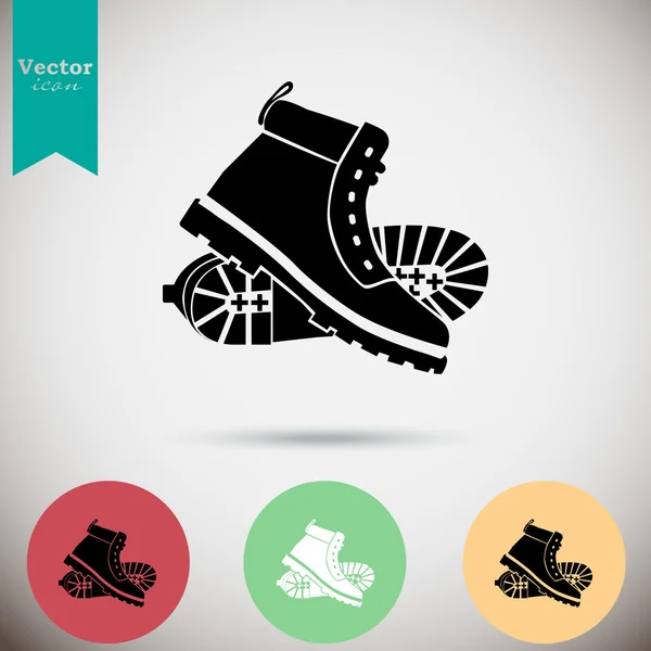 Icono botas de invierno — Vector de stock