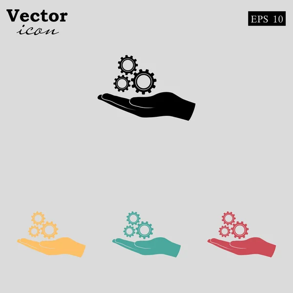 Ruka držící ikonu ozubených kol — Stockový vektor