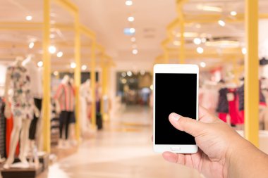 adam akıllı telefon tutun