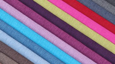 Renkli arkaplan, renkli kumaş yığını.