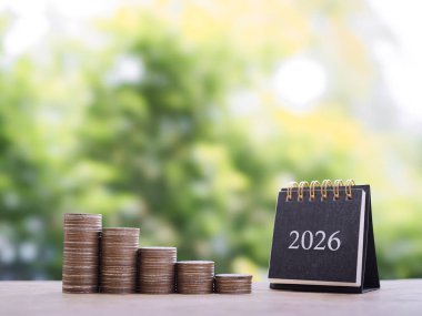 2026 masa takvimi ve bozuk para yığını. İş büyümesi, Finansal yatırım, piyasa hisseleri, kar iadesi, 2025 yılında bölünmüş ve iş fonu kavramı