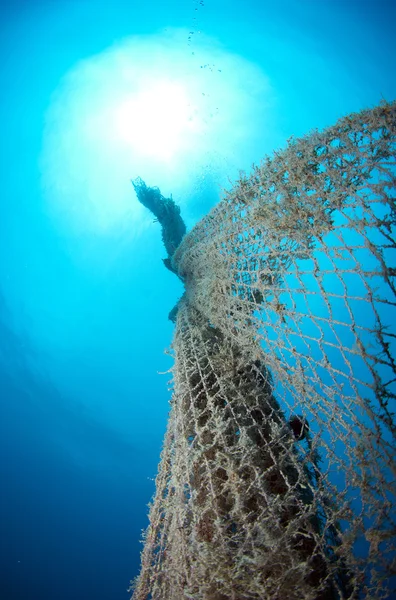 Velha rede de pesca abandonada — Fotografia de Stock