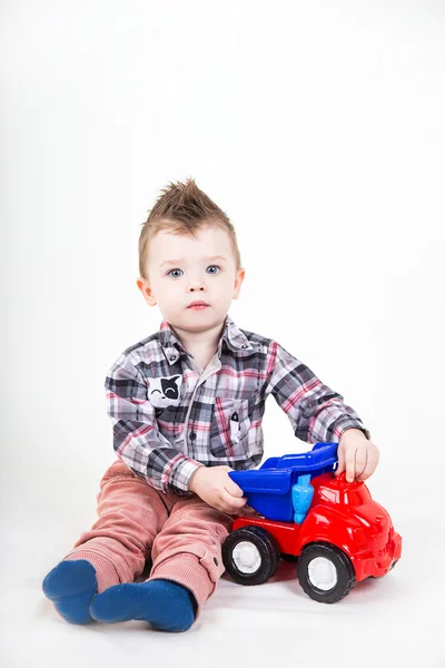 Baby boy pay with car — Stock Photo, Image