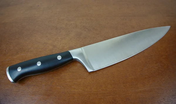 Şefin bıçak üstünde ahşap sayaç