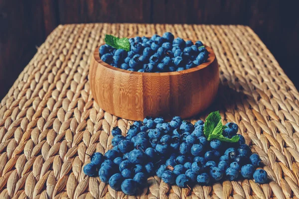 Blueberries on rattan table