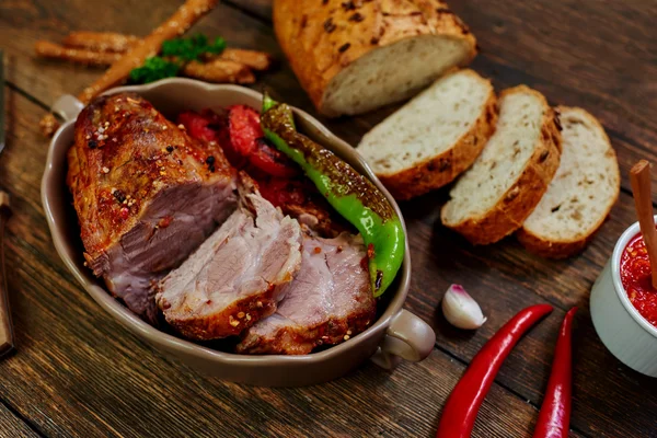 Fried meat lies in a metal bowl — Stock Photo, Image