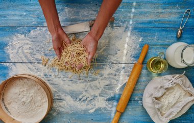 Cook woman preparing Italian pasta clipart