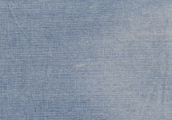 Niebieskie dżinsy włókienniczych tekstura. — Zdjęcie stockowe
