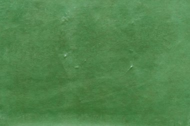 Yeşil deri doku yıpranmış. 