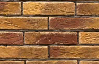 Turuncu ve kahverengi tuğla duvar doku. 