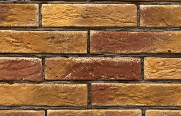 Turuncu ve kahverengi tuğla duvar doku. 