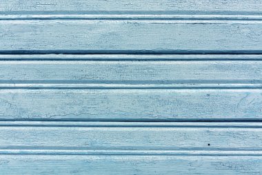 Yıpranmış ışık mavi hangar duvar.