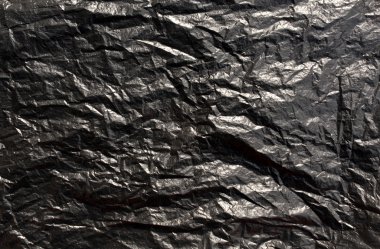 Black plastic bag texture. clipart