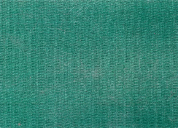 Выветриваемая зеленая ткань холста с царапинами — стоковое фото
