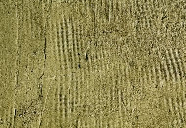 Sarı çimento duvar dokusu.