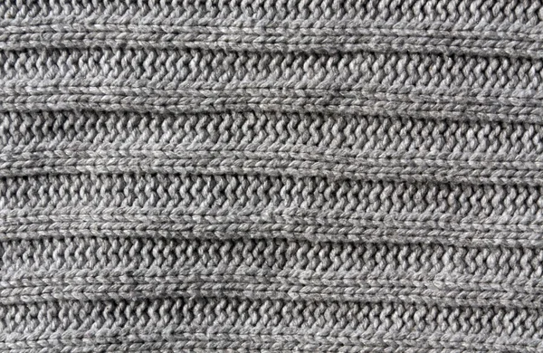 Streszczenie szary knittin szmatką tekstura. — Zdjęcie stockowe