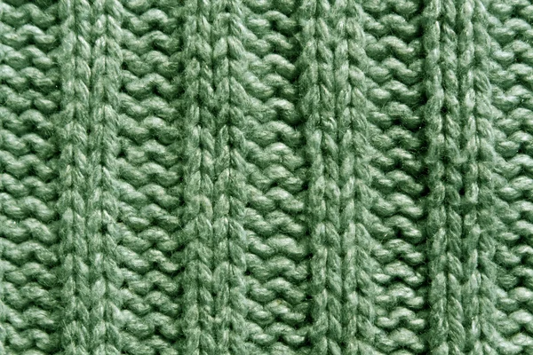 Astratto verde tessitura maglia primo piano . — Foto Stock