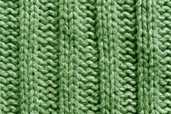 Abstrakt grön stickning textur närbild. — Stockfoto