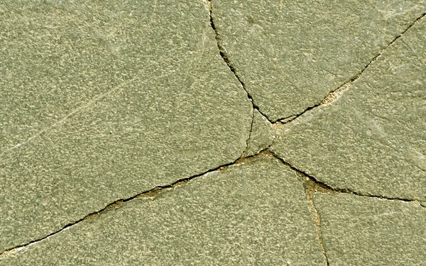 Cracked stone surface. — Stock Photo, Image
