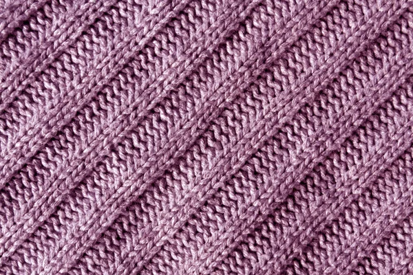 Textura de tela de punto rosa abstracta . — Foto de Stock