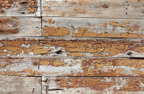 Weathered wooden wall texture with old paint. — Stock Photo, Image