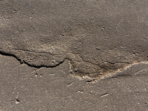 Abstract cracked asphalt texture. — Stock Photo, Image