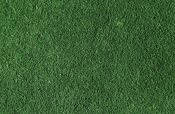 Abstracte groene atletiekbaan oppervlak. — Stockfoto