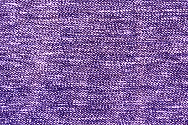 Абстрактна фіолетова текстура джинсів . — стокове фото