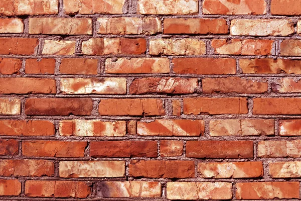 Textura de pared de ladrillo rojo gruñón . — Foto de Stock