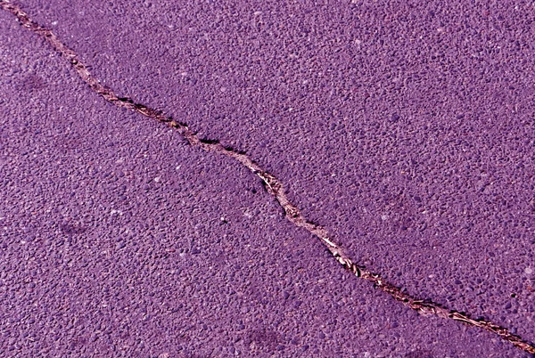 Cracked color asphalt surface. — Stock Photo, Image