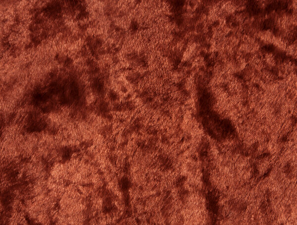 Red cloth surface.