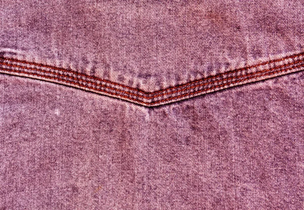 Rode jeans oppervlak met stitch. — Stockfoto