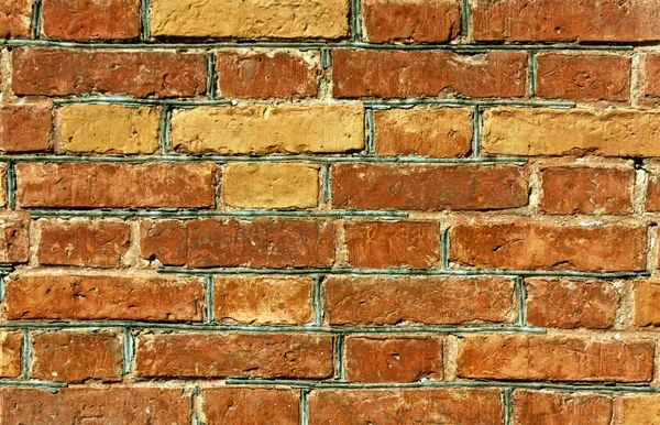 Weathered orange brick wall surface. — Stock Photo, Image