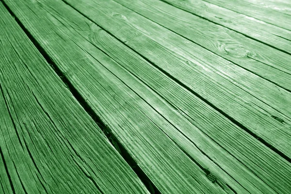 Old wooden terrace floor close-up with blur effect. Background and texture