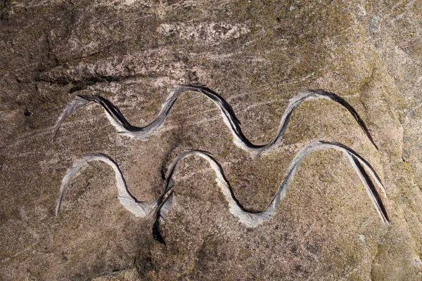 Kova Burcu Taşa Eğilmiş Gizemli Şaretler — Stok fotoğraf