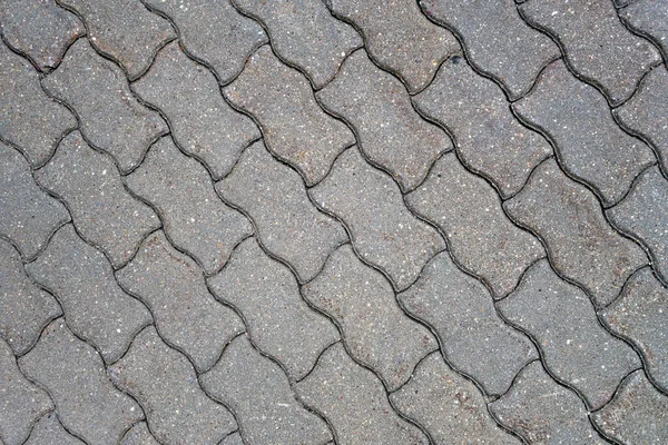 石舗装灰色の表面 概要デザインの背景とテクスチャ — ストック写真