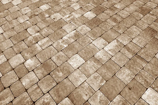 茶色のトーンで石畳の表面 概要デザインの背景とテクスチャ — ストック写真