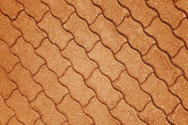 オレンジトーンで石畳の表面 概要デザインの背景とテクスチャ — ストック写真