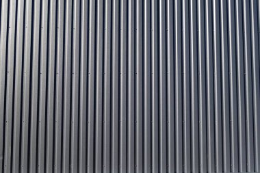 Sırtlı metal duvar arka planı. Mimari desen ve doku            