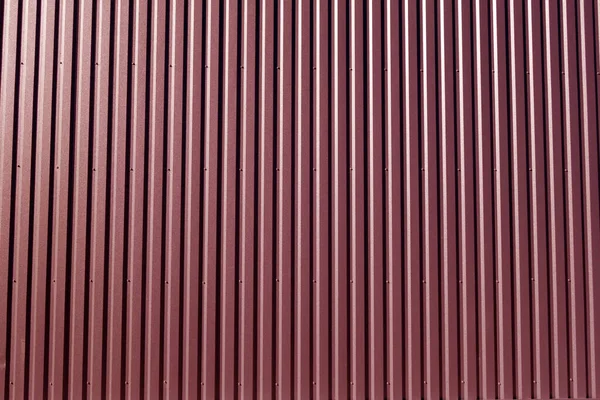 Ridged metal wall background. Architectural pattern and texture