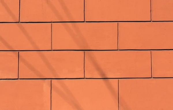 Orange stilisierte Ziegelwand Textur. — Stockfoto