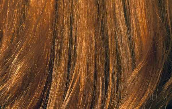 Textura de cabelo vermelho sob a luz solar . — Fotografia de Stock