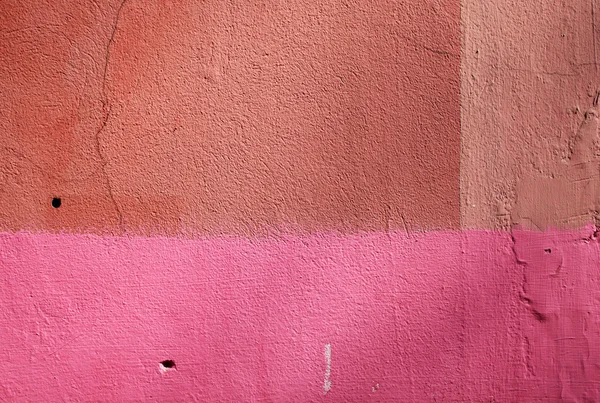 Pink and orange grunge plaster wall texture. — Stock Photo, Image