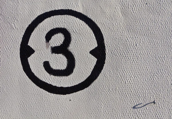 Number three on plaster wall. — Stock Photo, Image