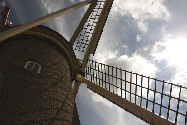 Old windmill and cloudy sky. — Stock Photo, Image